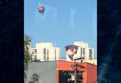 Testemunha flagra queda de balão e bandeira enroscada em prédio de SP