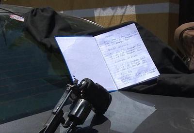 Caderno de miliciano que detalha armas e lucros é apreendido no RJ