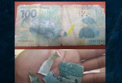 Mulher usa nota falsa de R$ 100 para comprar trufas de garoto no semáforo
