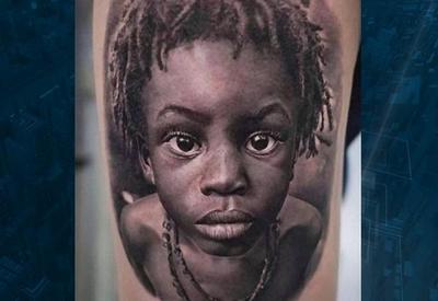 Rosto de criança negra é tatuado em desconhecido sem autorização